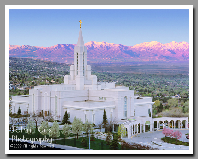 The morning sun glows off the Oquirrh Mountains in the distant background of the LDS Bountiful Temple.