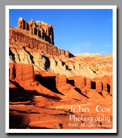 The Sandstone Buttress of the Castle glows a brilliant orange in Capitol Reef National Park