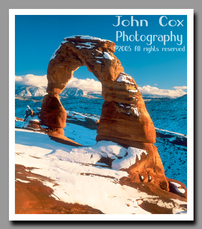 Delicate Arch surrounded by a fresh blanket of snow in Arches National Park, Utah