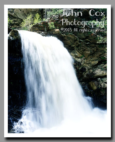 A small stream tumbles over a waterfall in Farmington Canyon, Utah.