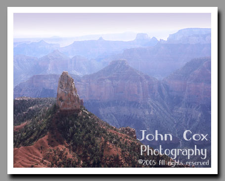 Light mists shroud the Grand Canyon from Point Imperial in Grand Canyon National Park in Arizona.