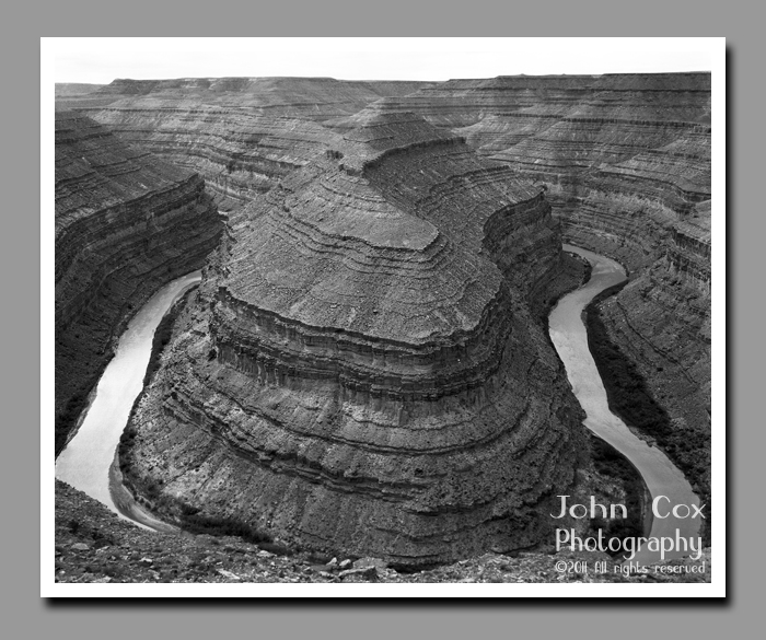 The San Juan River bends around a gooseneck.