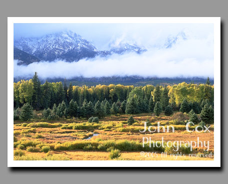 Clouds clear out of the Grand Tetons, Grand Teton National Park, Wyoming.