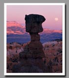 The Moon rises behind Thor's Hammer in Bryce Canyon National Park, Utah.